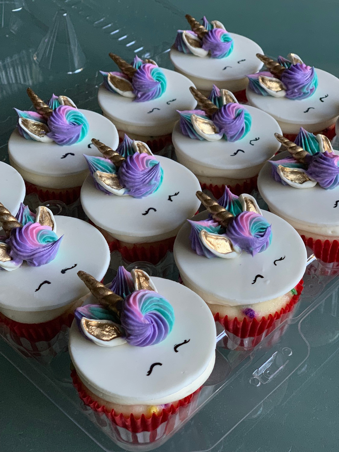 Pink, purple, and teal Unicorn cupcakes