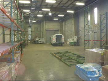 Internal steel frame warehouse roof support.