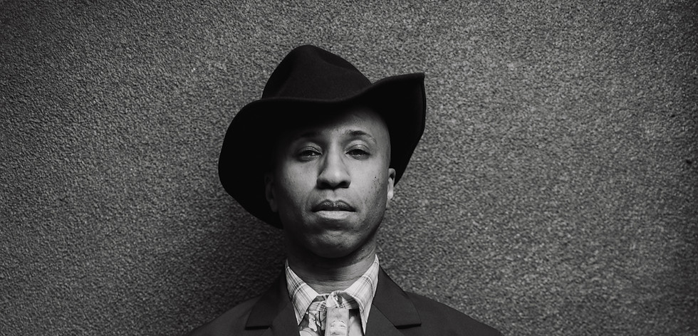 Elle Jaye Photo - Omari Tau (hat black and white).jpeg