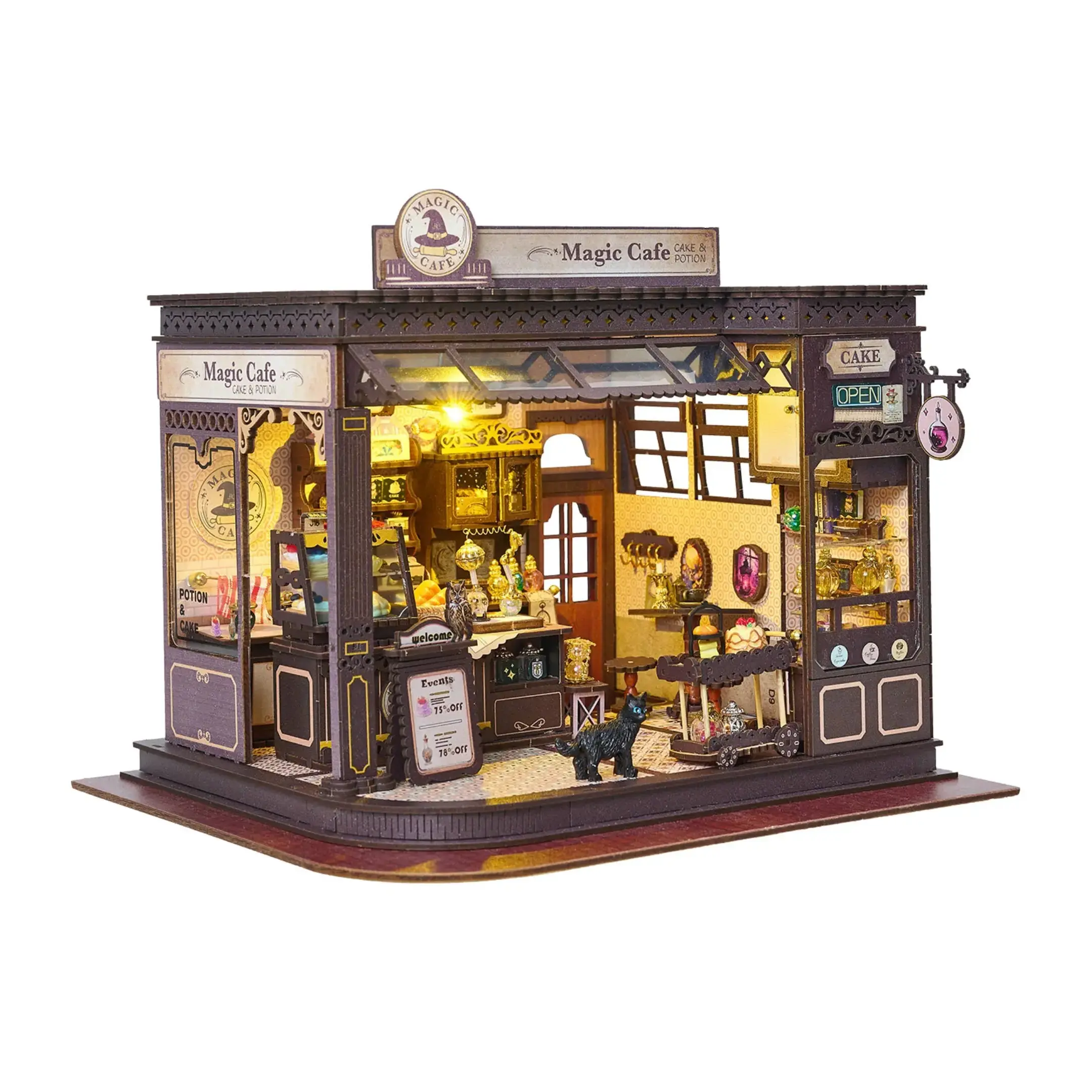 Magic café house kit by HandCraft with miniature furniture, pastries, shelves, and cozy LED lighting