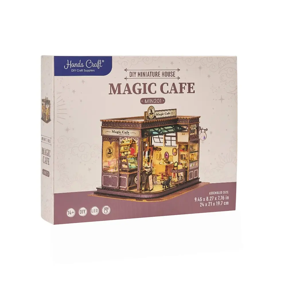 Thumbnail: Magic café house kit by HandCraft with miniature furniture, pastries, shelves, and cozy LED lighting