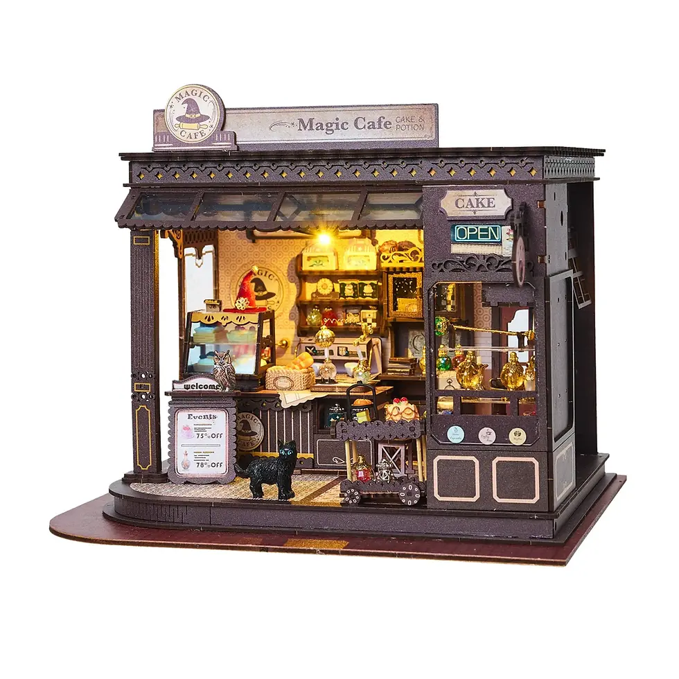 Thumbnail: Magic café house kit by HandCraft with miniature furniture, pastries, shelves, and cozy LED lighting
