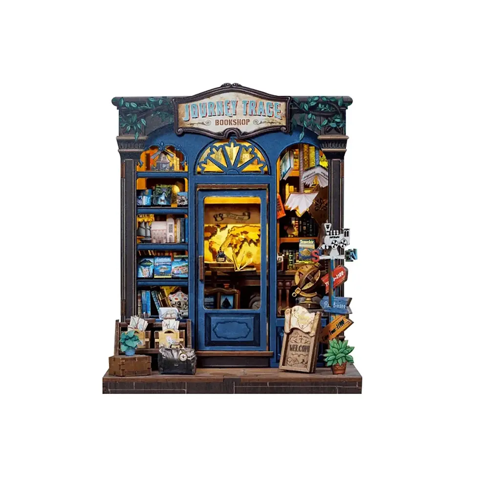 Thumbnail: Journey Trace Bookshop book nook set by HandCraft with miniature shelves, stairs, books, and warm LED lighting