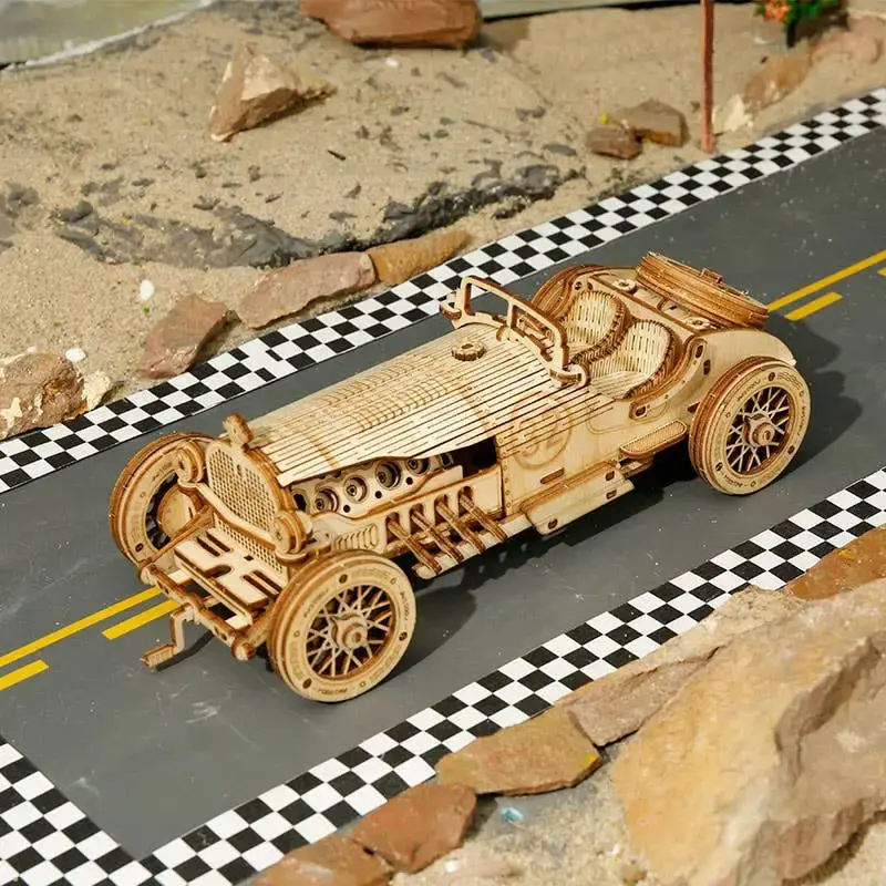 Thumbnail: Grand Prix car wooden puzzle set with vintage open-cockpit design and exposed mechanical details