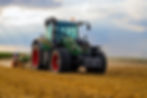 Tractor-plowing-the-fields-on-focu
