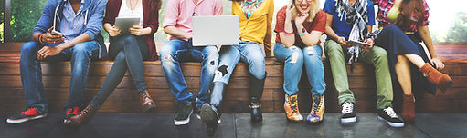 Teens sitting together.