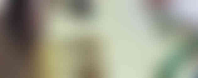 Race participant medals displayed on table