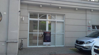 Modern dental office entrance with sign