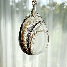 resin transparent pendant with multiple locks of hair