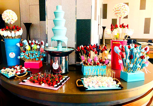 Tbale of Candi and Chocolate Machine for hire