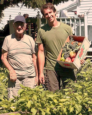 Cole and his grandpa in the garden