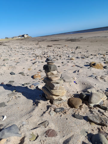 A stack of stones on a beach