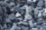 an up close photo of black gravel