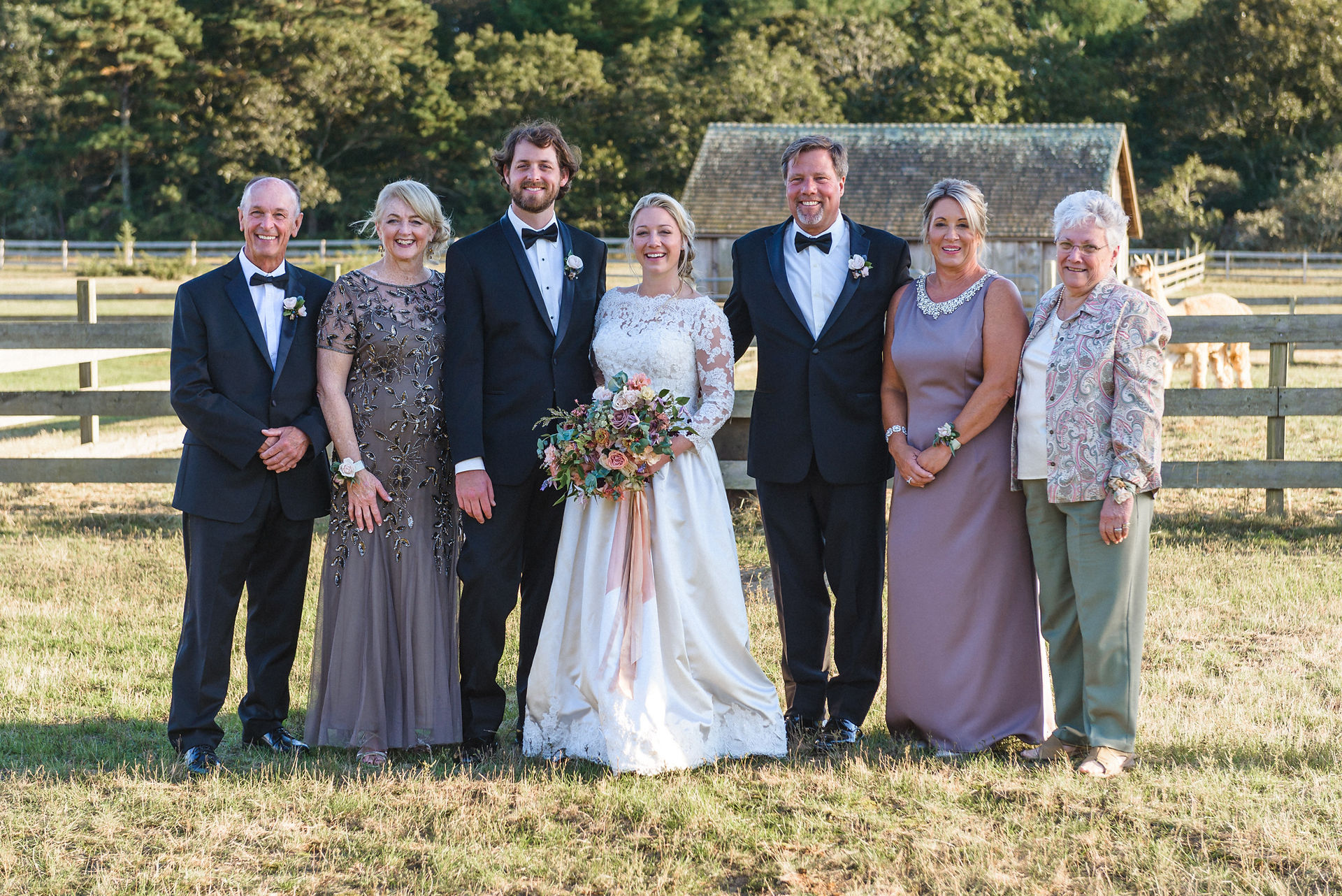 A formal family photo at Island Alpaca Company photo by David Welch Photography