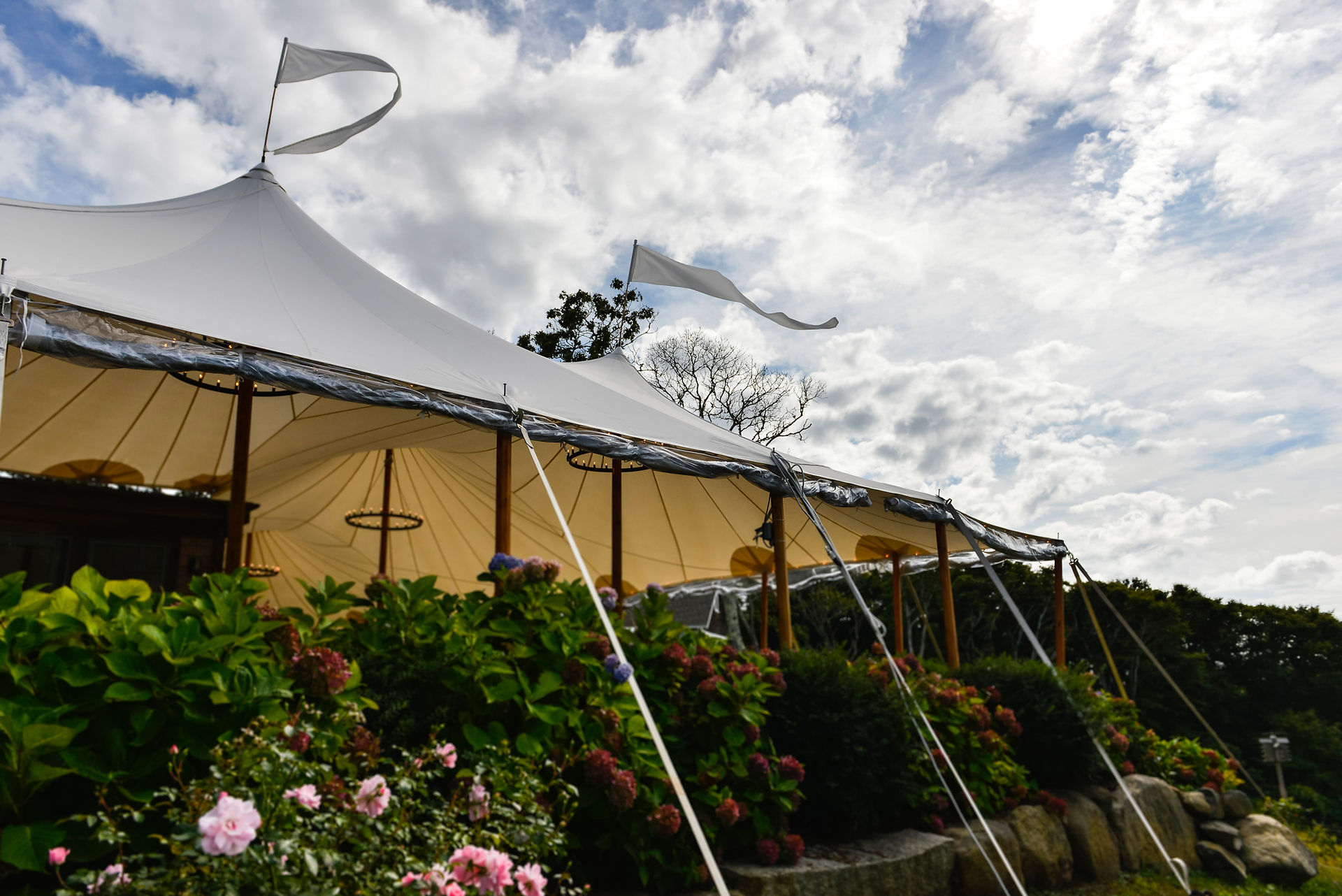 A reception tent against a glorious sky at The Beach Plum Inn & Restaurant photo by David Welch Photography