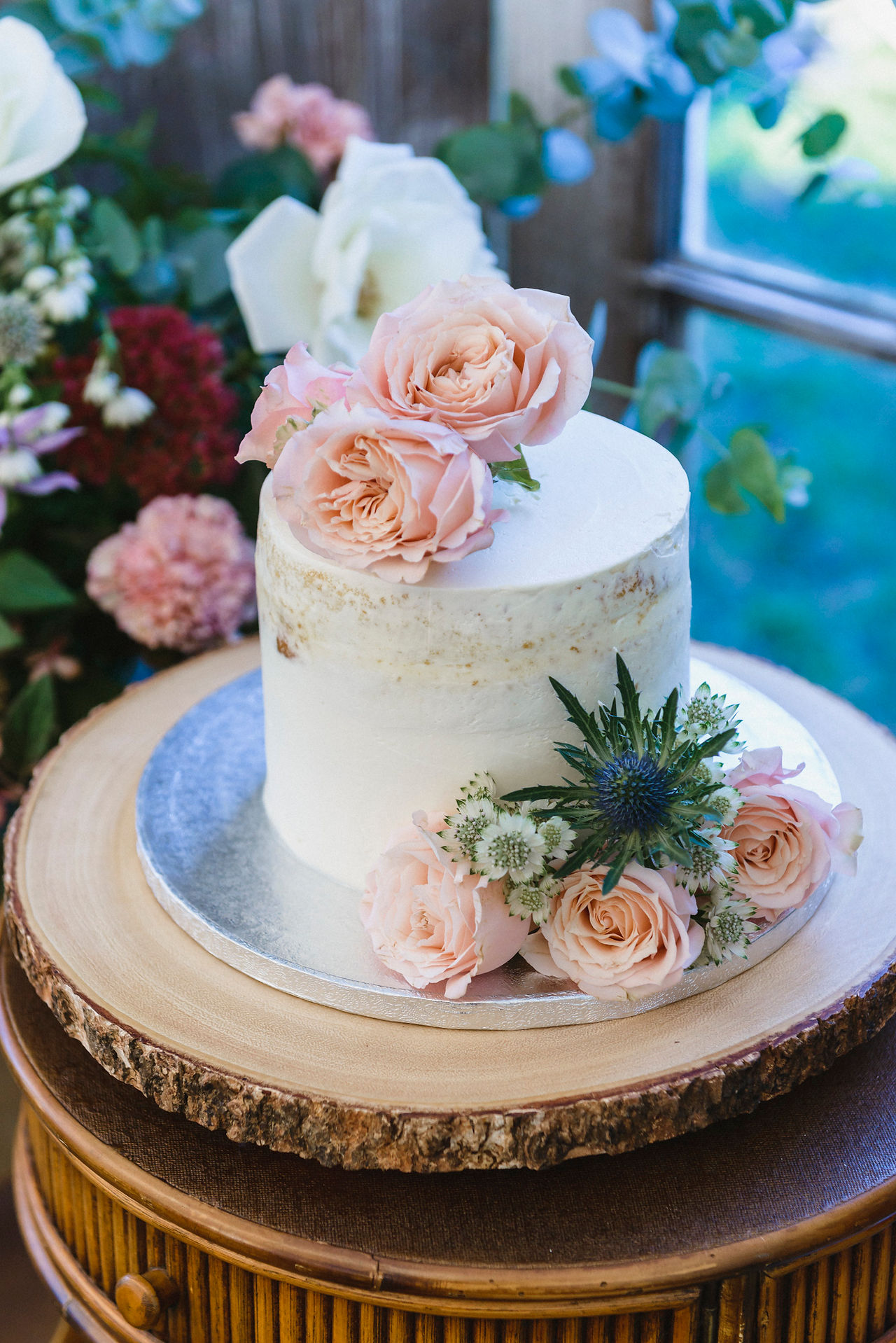 A small wedding cake at Island Alpaca Company on Martha's Vineyard photo by David Welch Photography