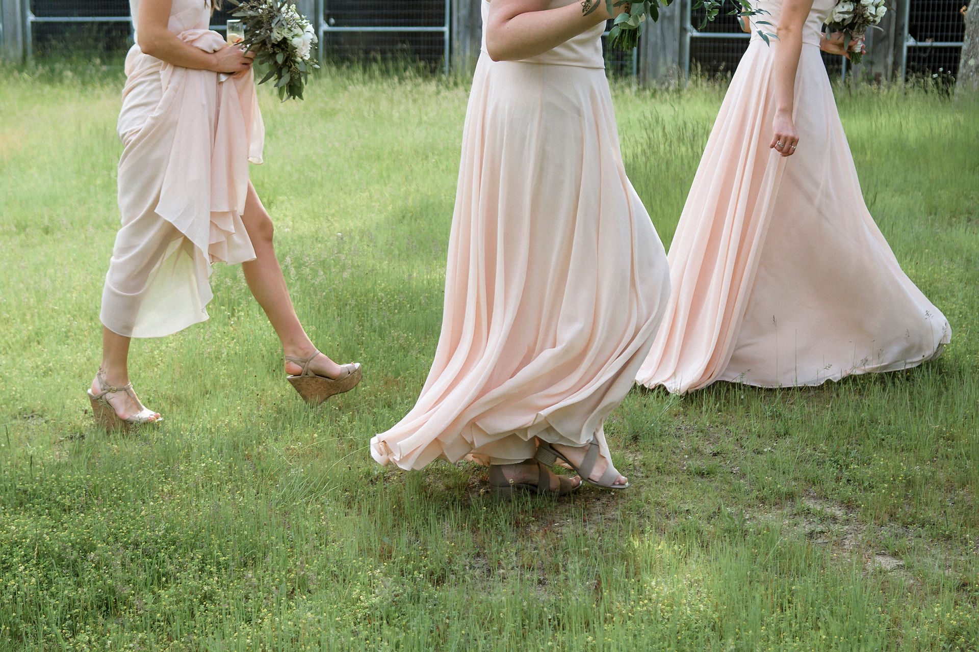 A wedding party poses for photos at a barn in West Tisbury photo by David Welch Photography