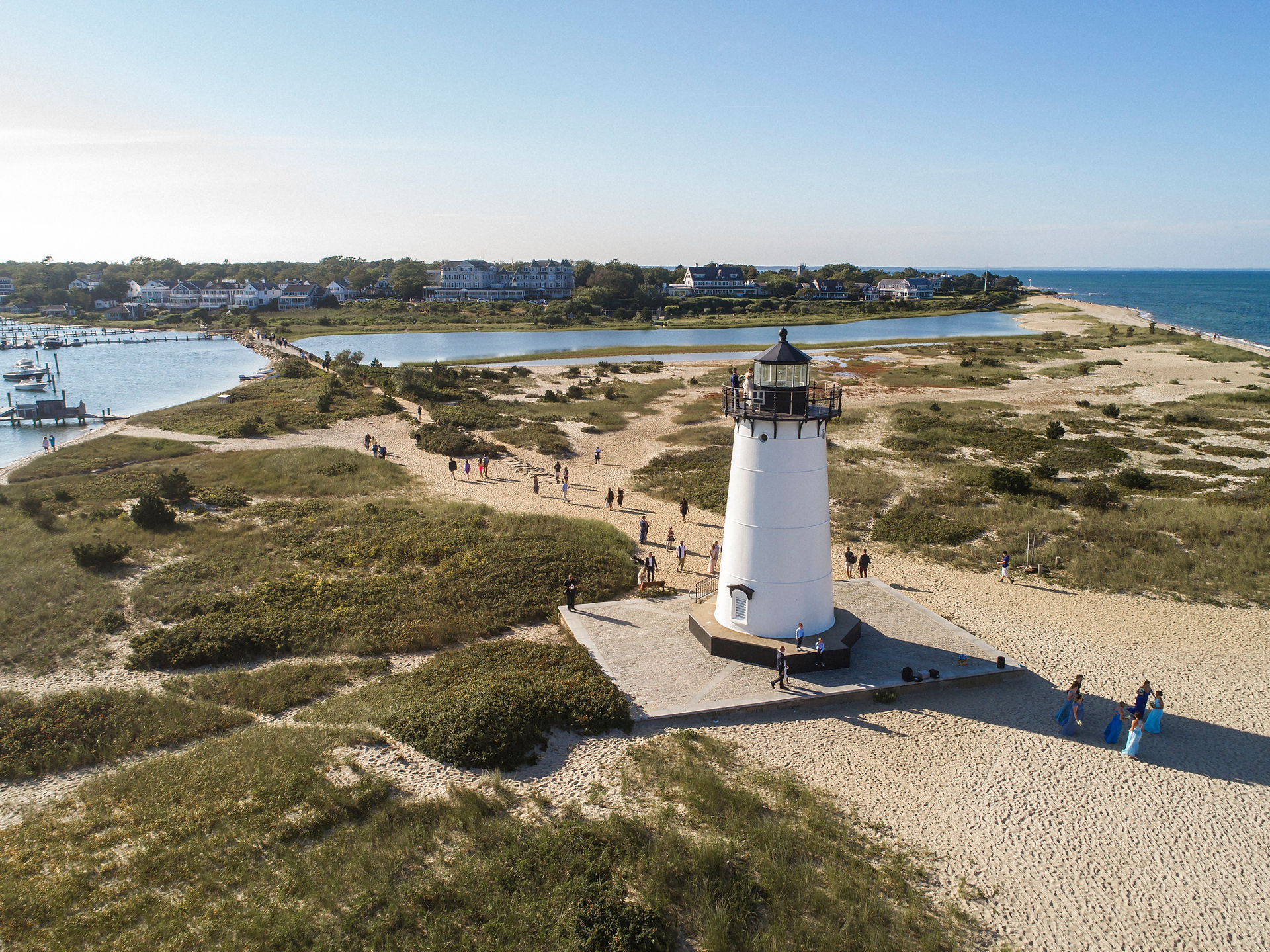 A drone photo of a wedding ceremony at the Edgartown Lighthouse on Martha's Vineyard photo by David Welch Photography