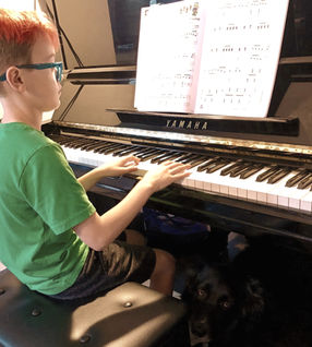 William at piano lesson.jpg
