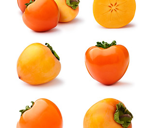 Set of whole and halved Hachiya persimmo