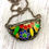 Thumbnail: Half Circle Glass and Tin Necklace - Multi Flowers Blue