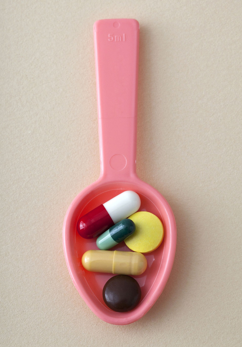 Spoon with pills in it