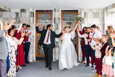 Bride and Groom exit the Dallas LDS Temple to a cheering crowd.