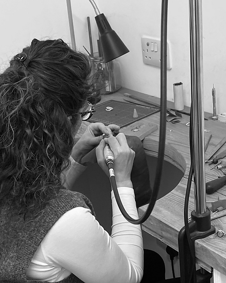 Maria Izamis working at the bench