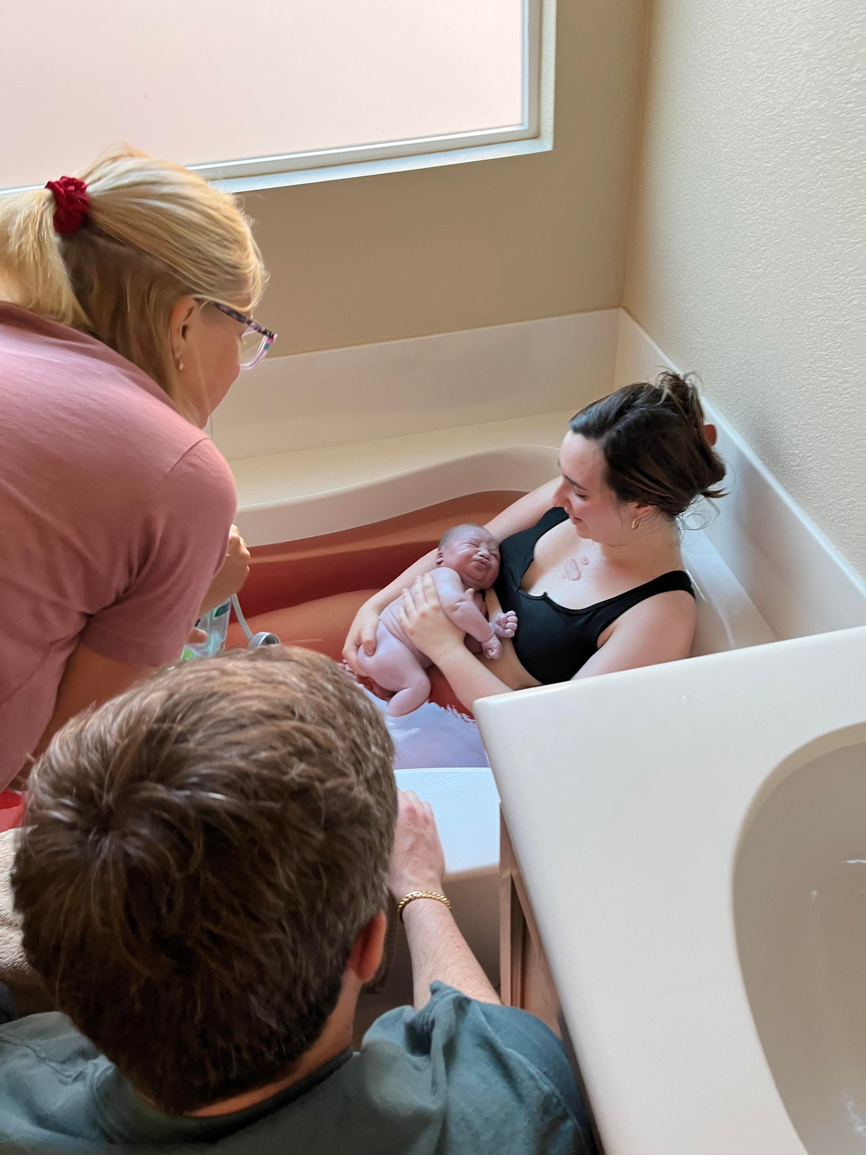 Water birth with midwife support