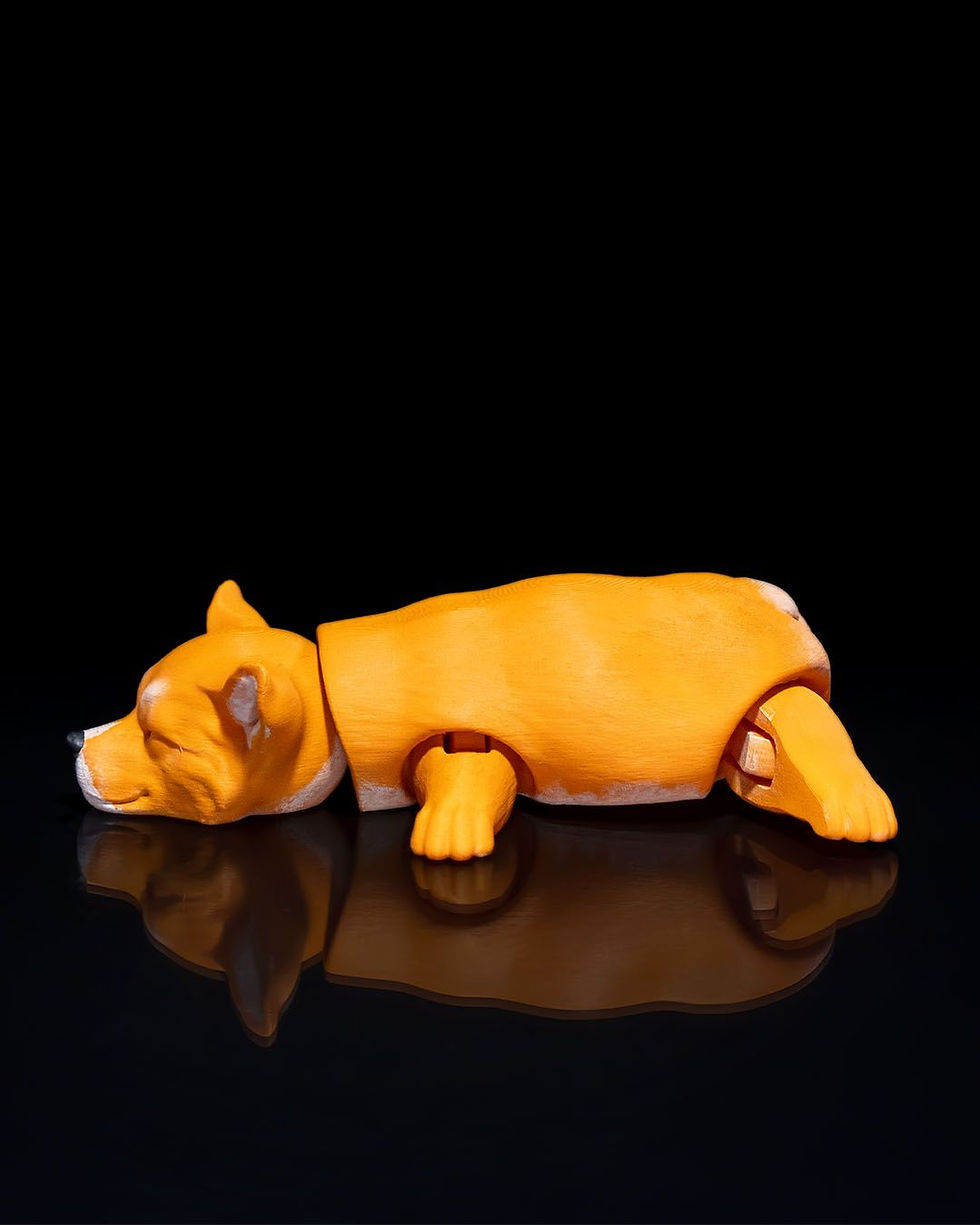 Thumbnail: Disassembled orange corgi toy