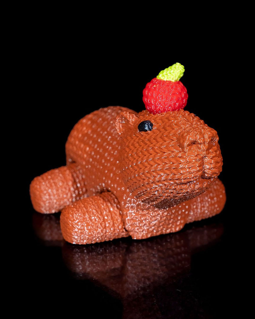 Thumbnail: Cute 3D-printed capybara figurine with apple