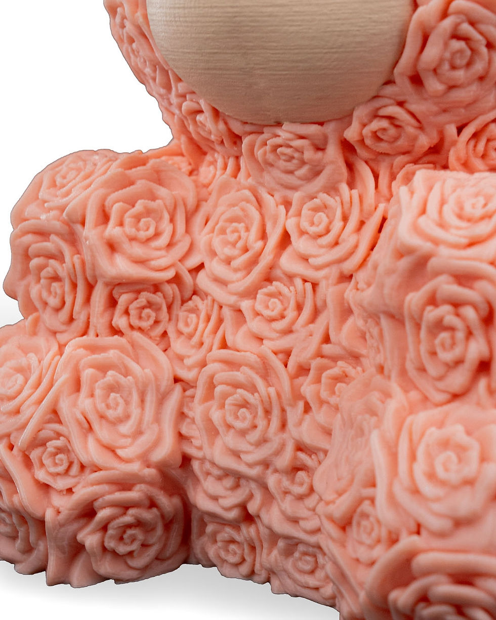 Thumbnail: Close-up of peach-colored rose sculpture