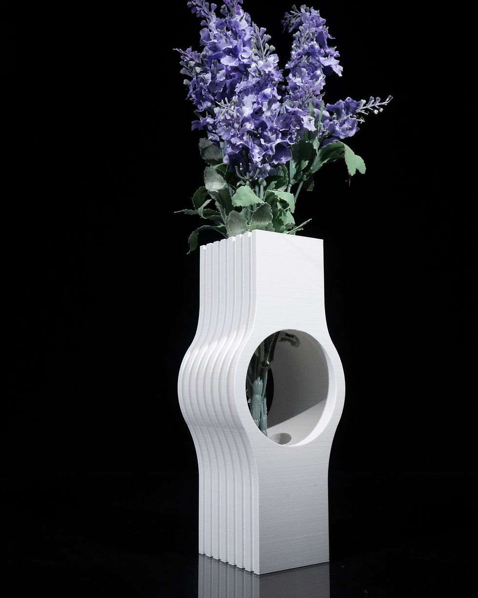 Thumbnail: White vase with purple flowers, unique design