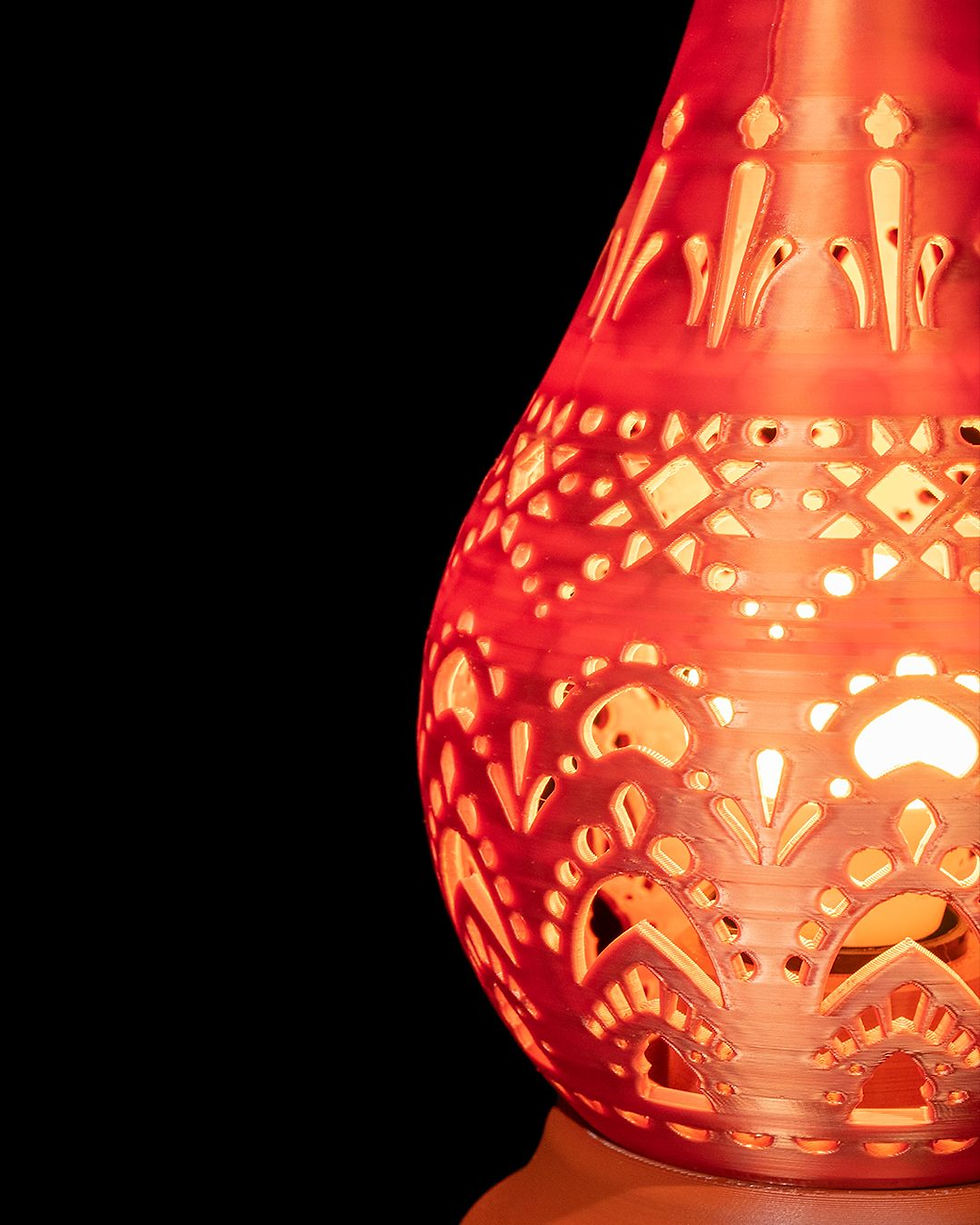 Thumbnail: Red, ornate, 3D-printed lampshade glows