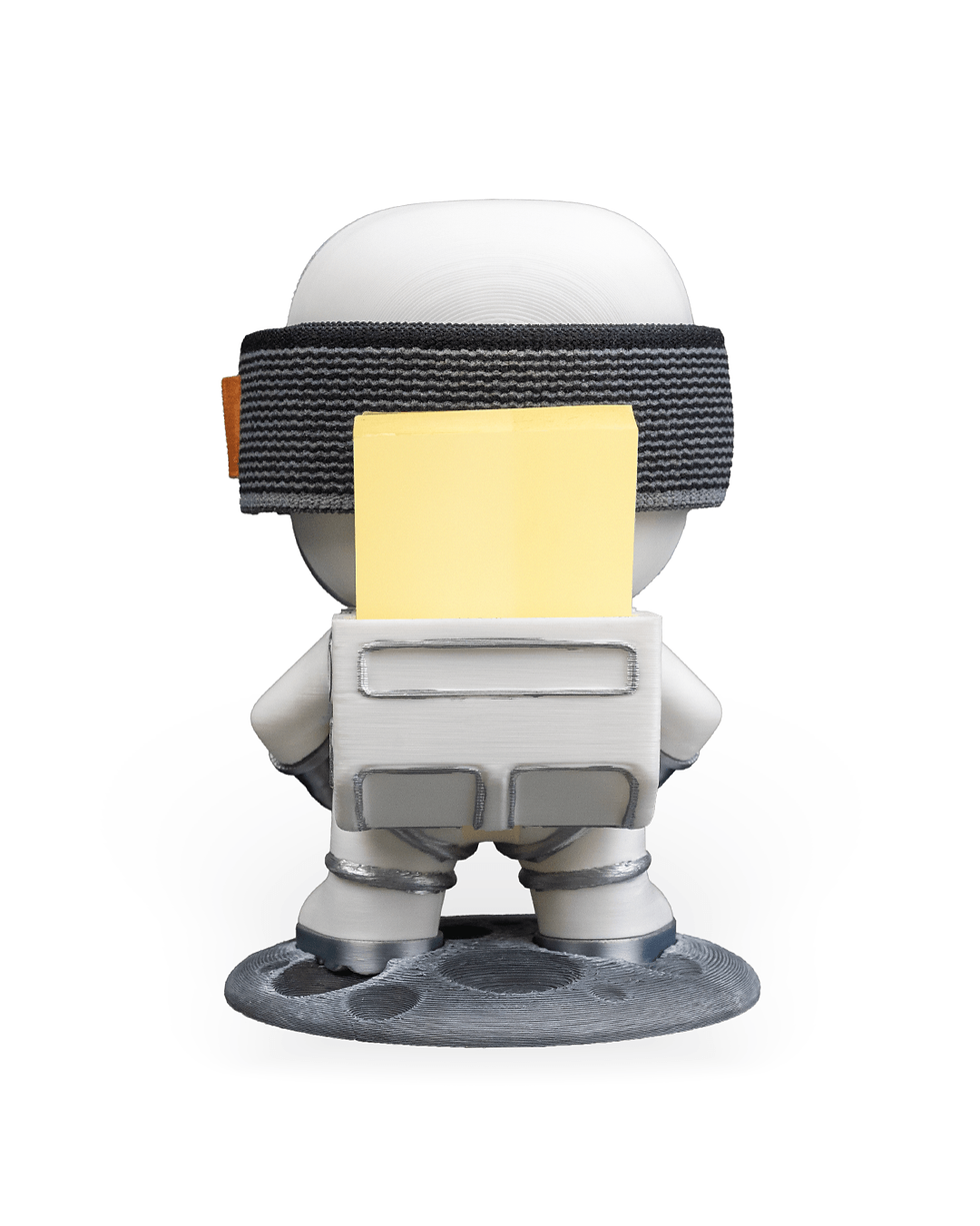 Thumbnail: Astronaut figurine with sticky note