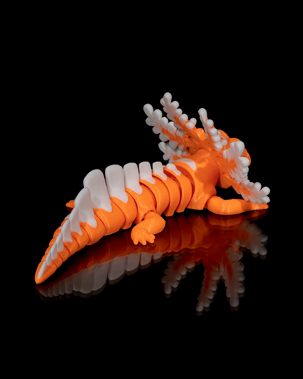 Miniature : Orange and white axolotl figurine