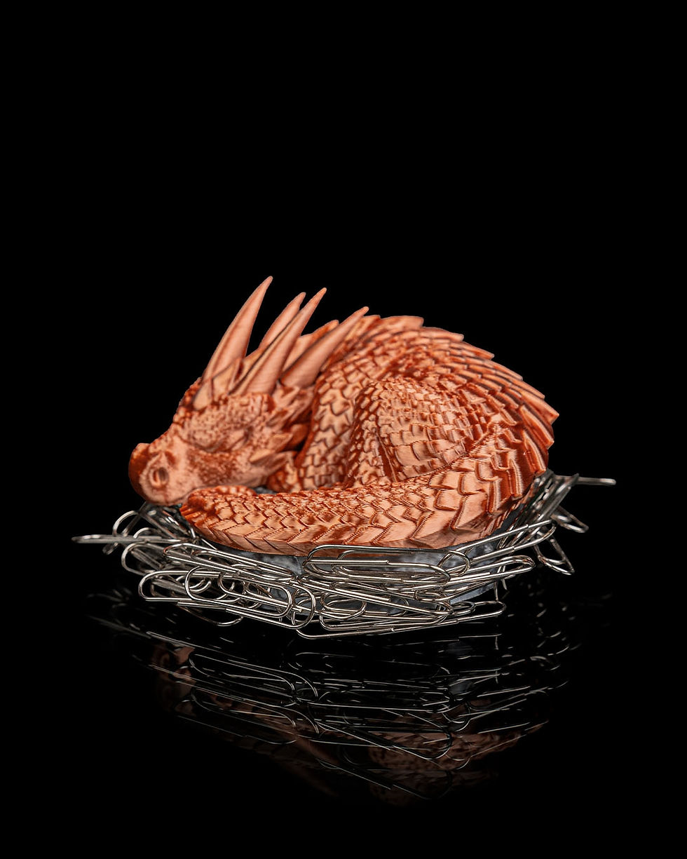 Thumbnail: Copper dragon figurine in paperclip nest
