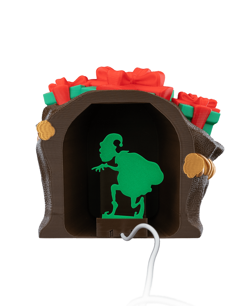 Thumbnail: Green elf figurine in a Christmas gift sack