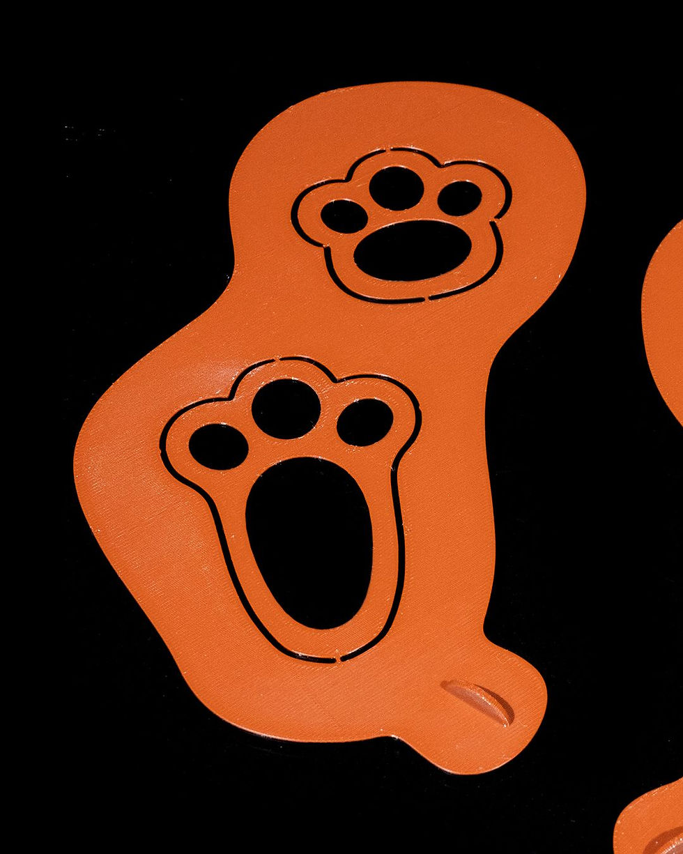 Thumbnail: Orange paw print stencils