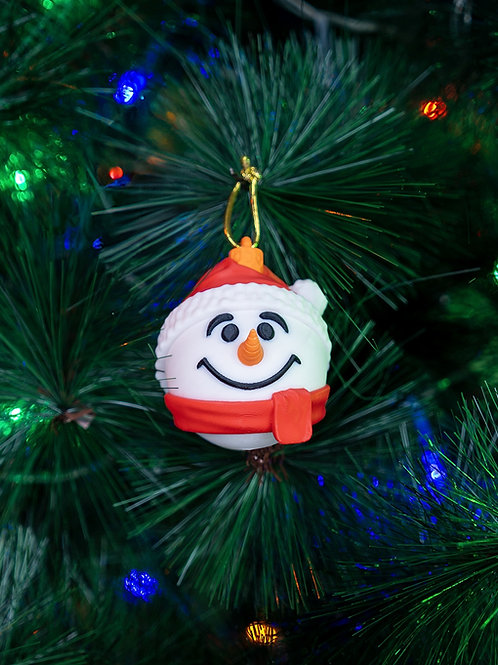 Smiling snowman Christmas ornament hanging on tree