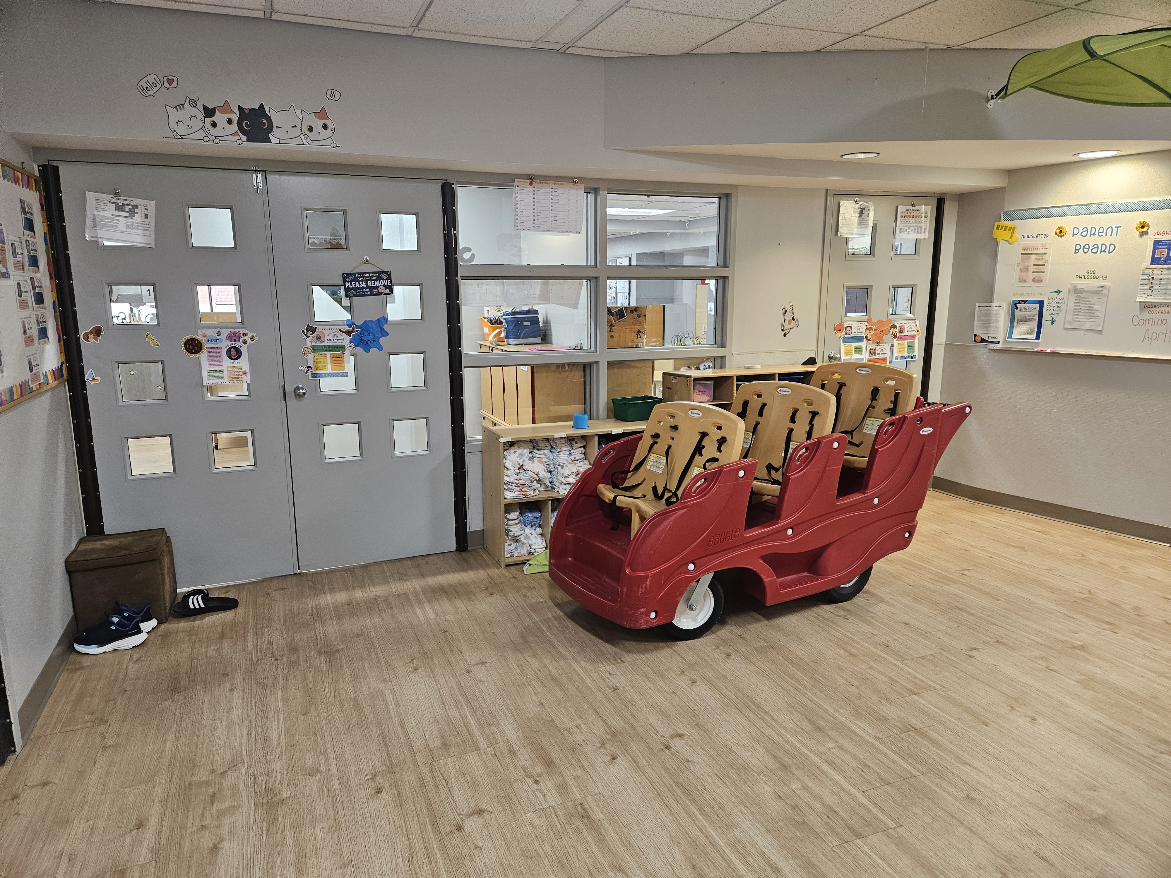 Infant daycare classroom at Rainbow Castle CDC in Saint Louis with cribs and soft play area