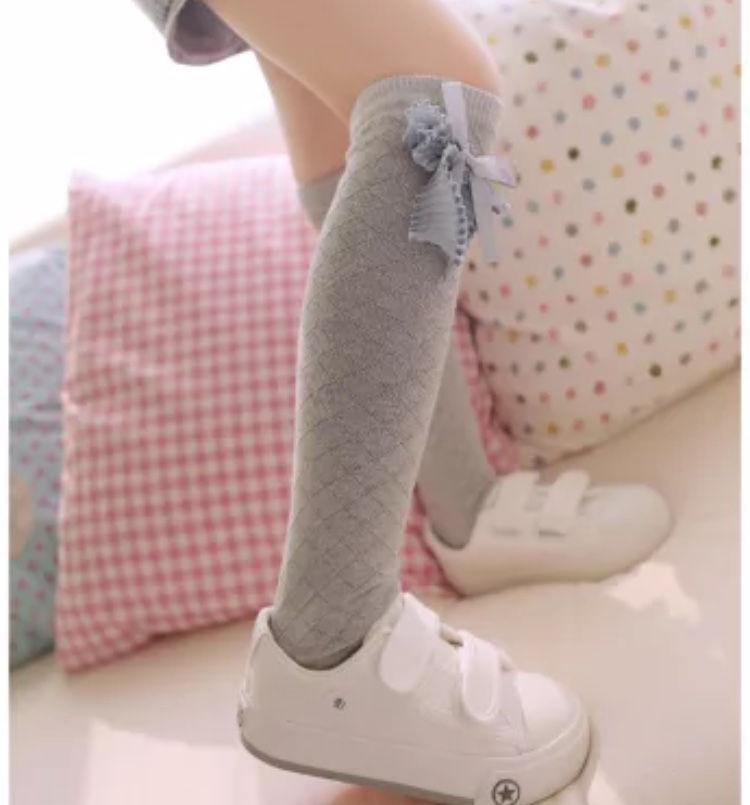 Miniatura: Meia com laço