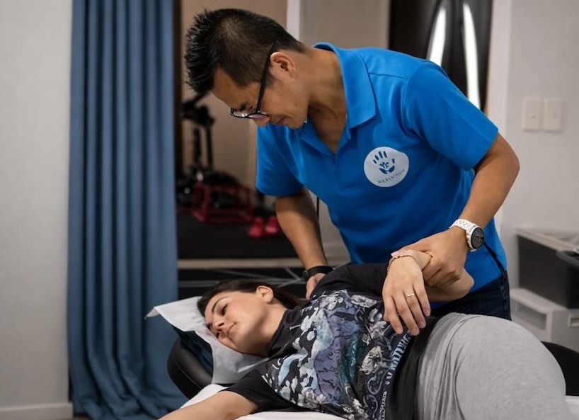 Hill Yang, exercise scientist Gold Coast, demonstrating Dynamic Myofascial Release (DMFR)