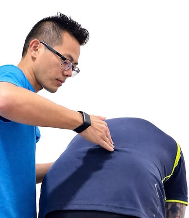 Hill Yang performing clothed remedial massage assessment, Heal Young Massage Varsity Lakes Gold Coast