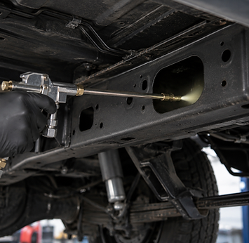 applying of cavity wax to cassis rail.png