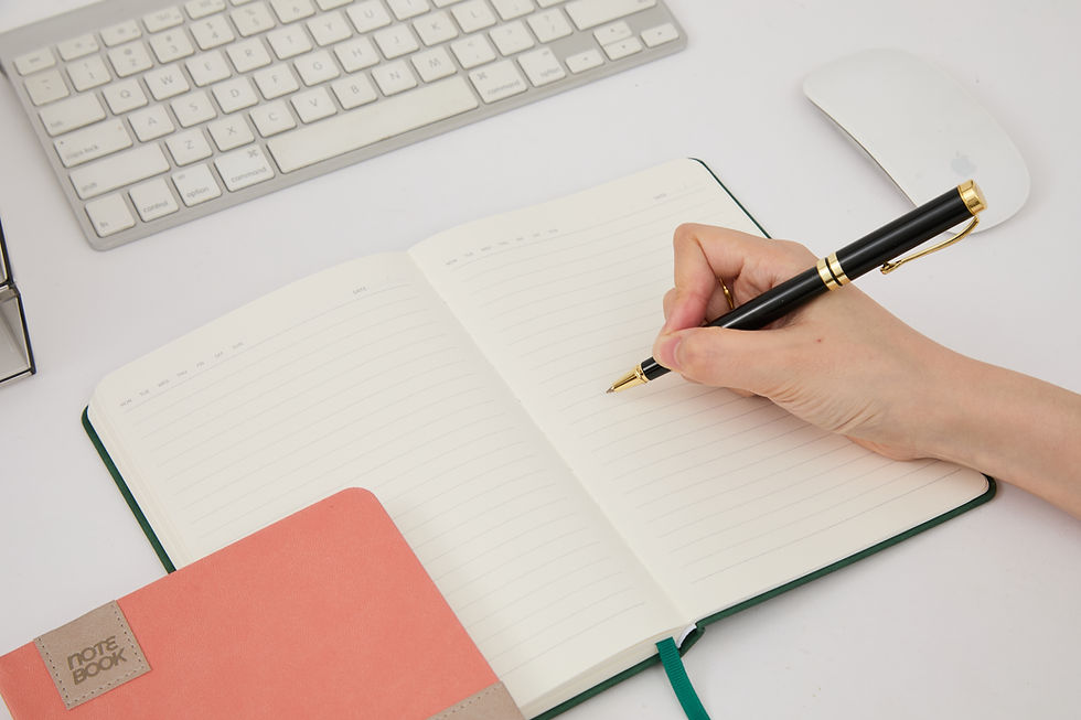 Writing on notebooks.