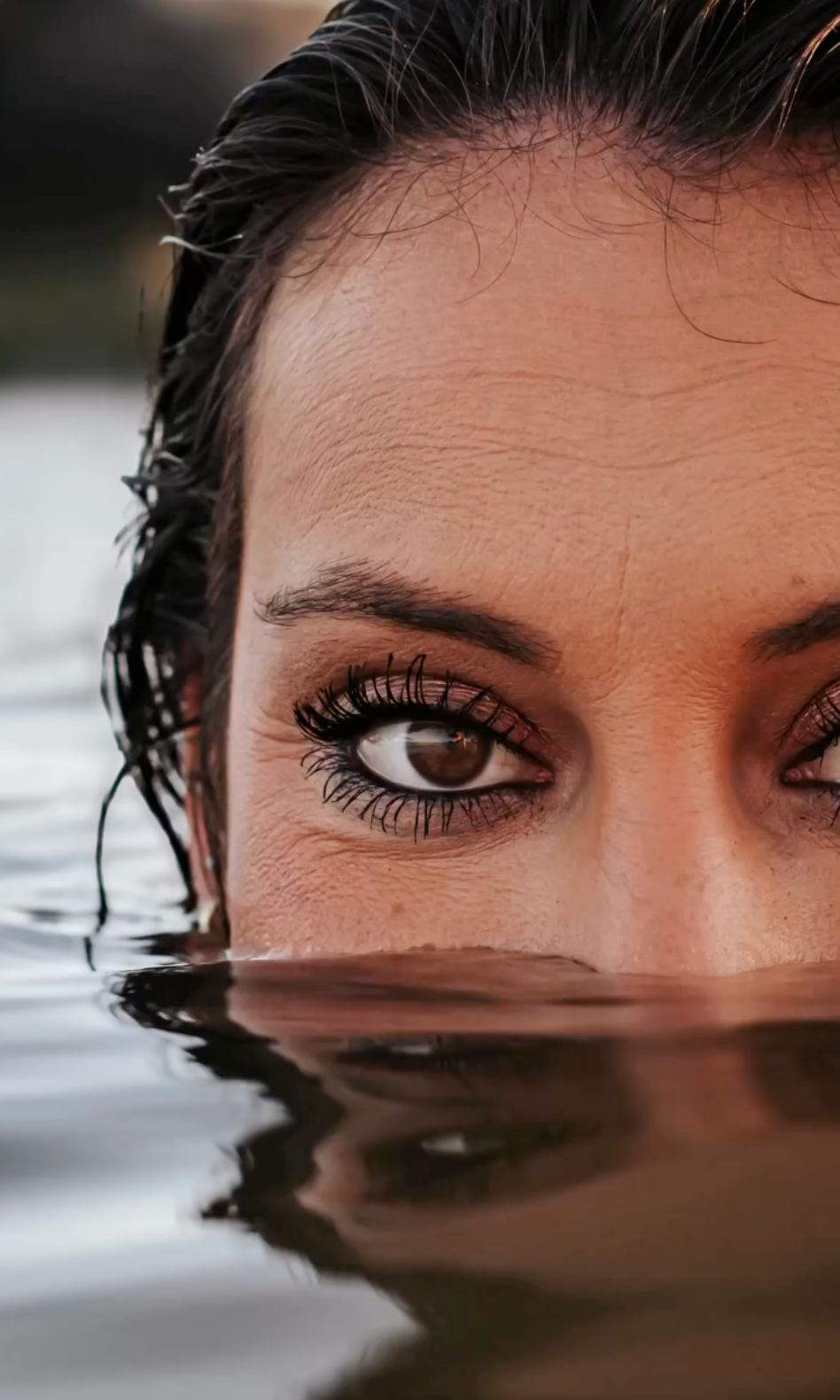 Portrait in Water — Half-Submerged Close-Up