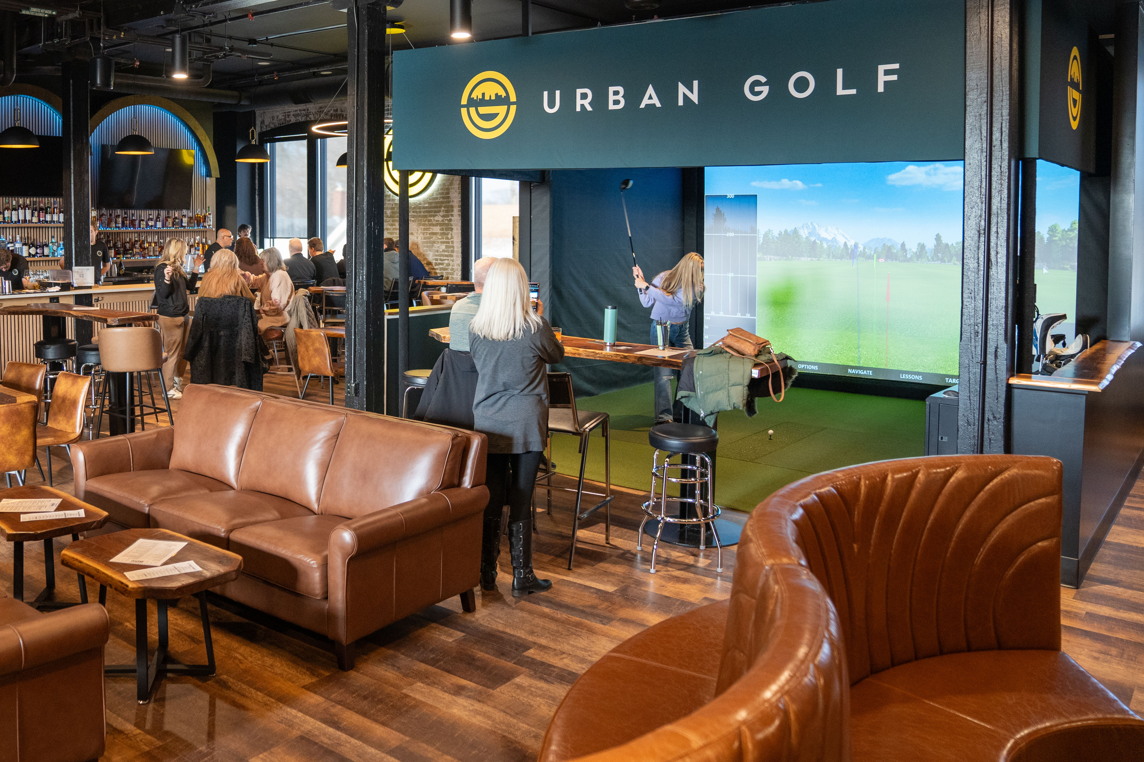 Indoor golf simulator bays at Urban Golf, The Fairfield Fort Wayne