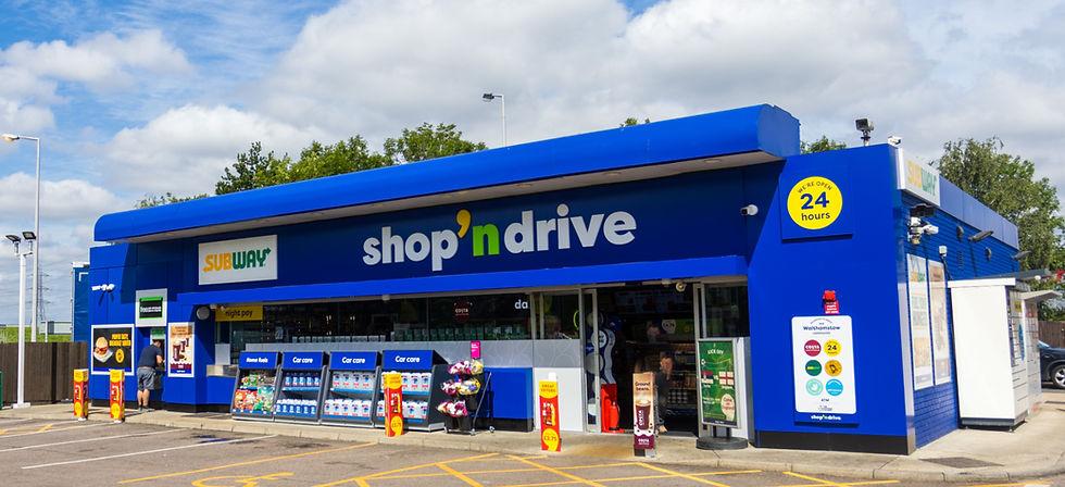 Exterior of the newly rebranded Shop'N Drive forecourt store with bold signage, modern design, and a welcoming entrance.