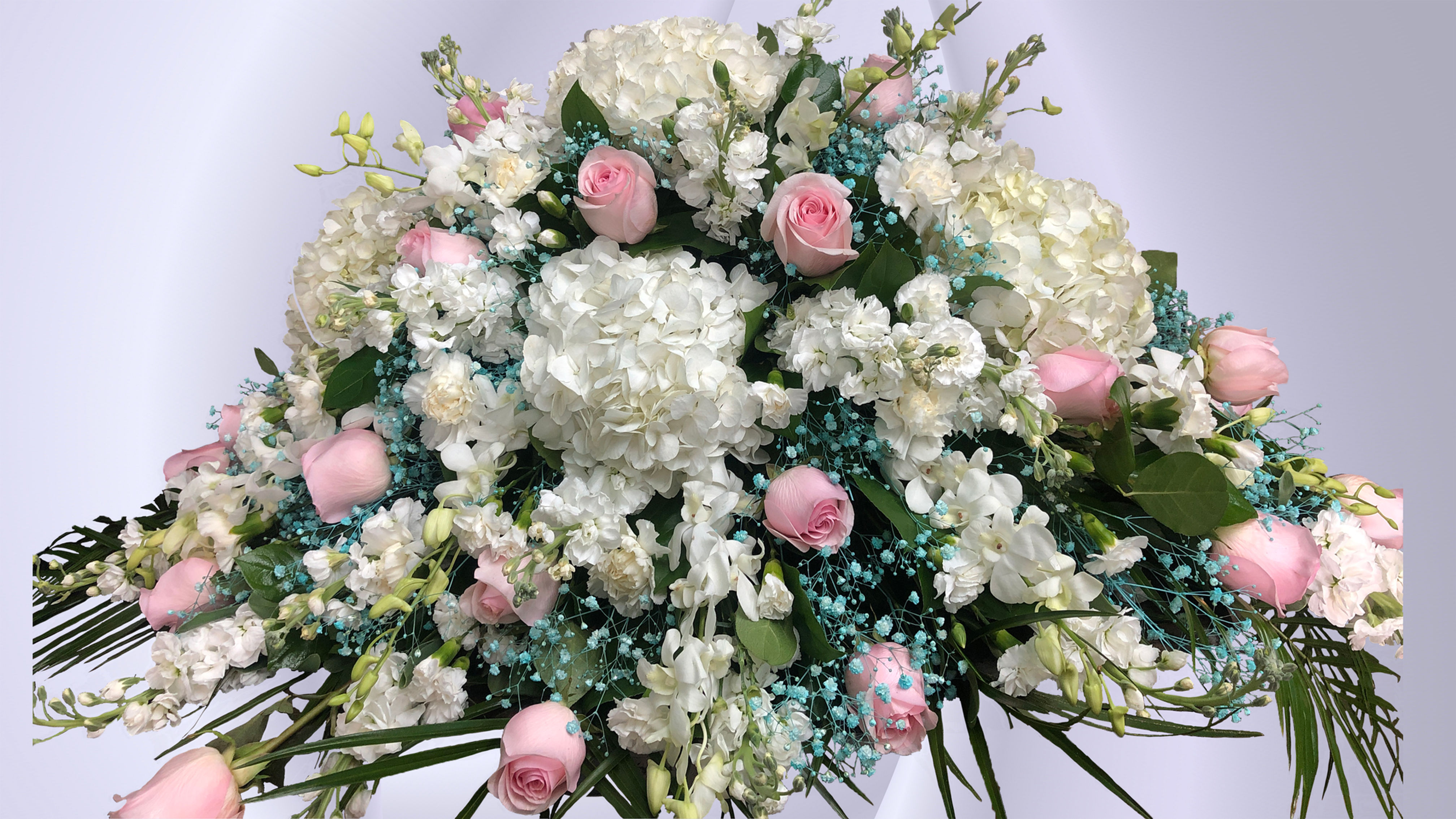 Blushing Elegance Casket Spray